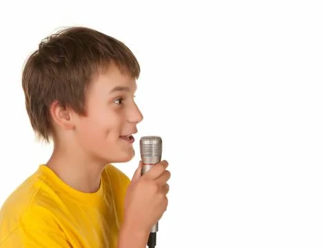 Boy speking with microphone Stock Photos