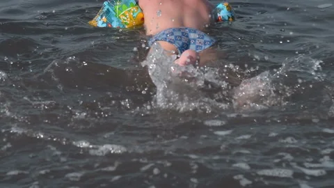 Boy splashing water when bathing Video stock 89825825