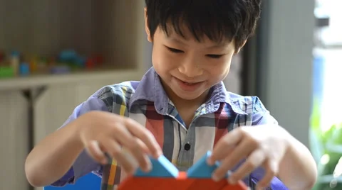 Boy stacking blocks Stock Footage 52902177