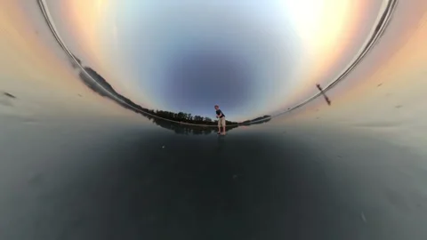 Boy Standing On Wet Beach Sand In Tiny Planet Perspective Stock Footage 306783959
