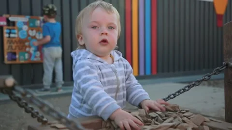 The boy stands at the educational game Stock-Footage 137541377