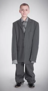 Boy stands in jacket Stock Photos