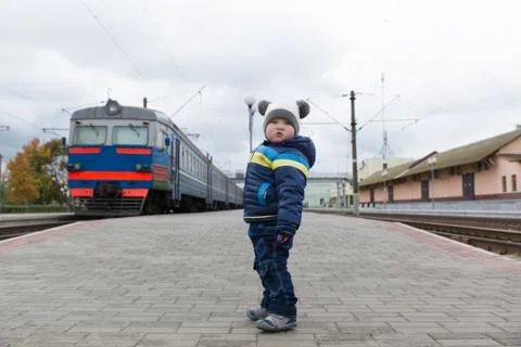 Boy stands on the platform Stock Photos