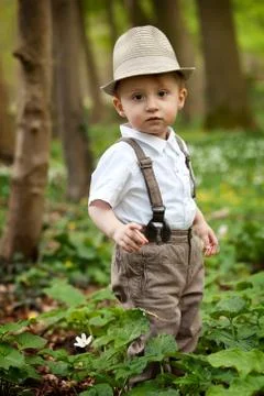 Boy with straw hat Stock Photos
