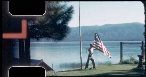 Boy struggles to raise American Flag, succeeds, 1942, 8mm Stock Footage 197342530