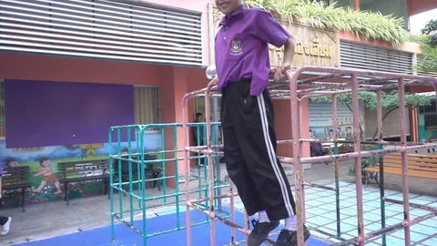 Boy students climbing on the robe at school slow motion HD Stock-Footage 86170346