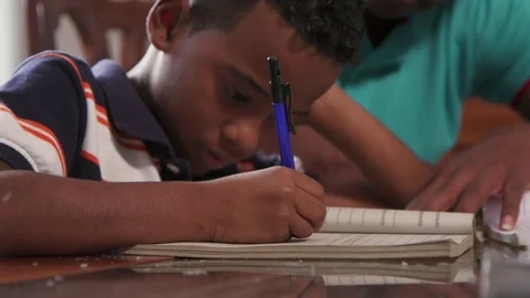 Boy Studying Education With Father Helping Son Doing School Homework Stock Footage