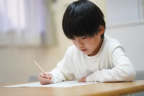 A boy studying Stock Photos