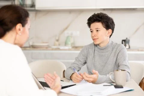 Boy studying with tutor Stock Photos