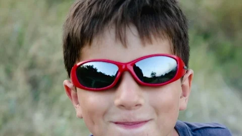 Boy sunglasses smiling Stock Footage 75811182