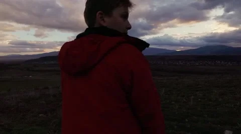 Boy at sunset Stock Footage 61428936