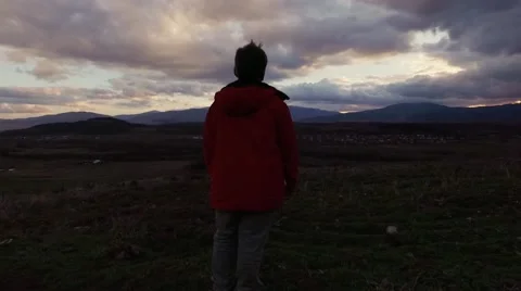 Boy at sunset Stock Footage 61429268