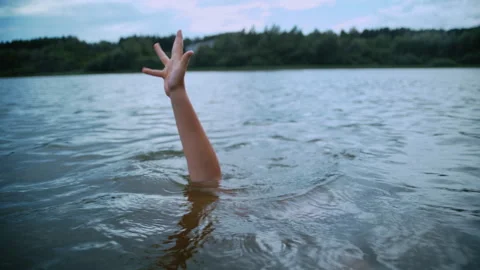 Boy Surfacing From Lake After Making Peace Sign Stock Footage 344692370