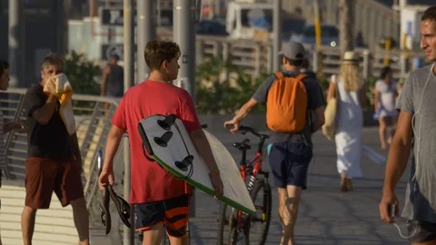 Boy with surfboard Stock Footage 90107220