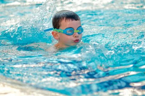 Boy swimming Freestyle Stock Photos