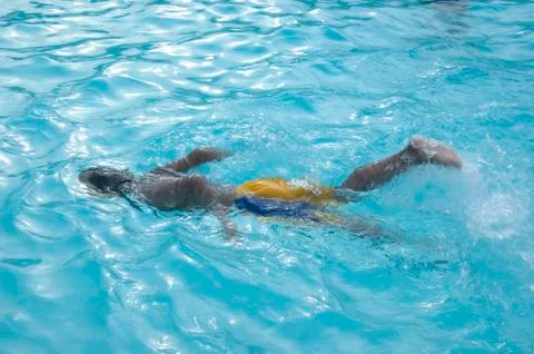 Boy swimming Stock Photos