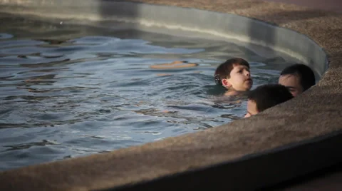 Boy on swimming pool Stock Footage 34342994