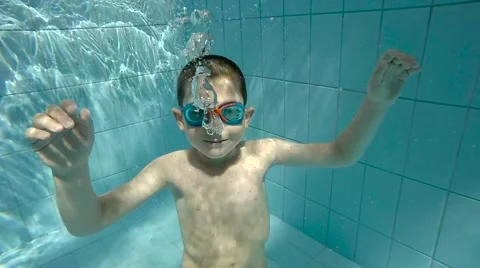 Boy in swimming pool Stock Footage 62637405