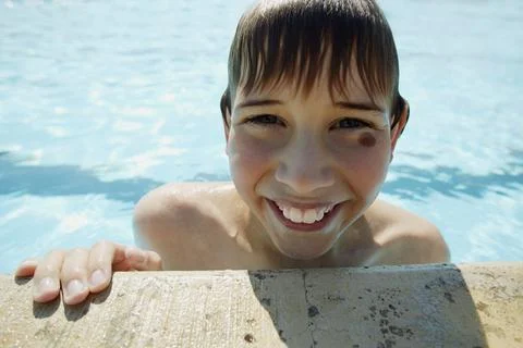 Boy In Swimming Pool Stock Photos