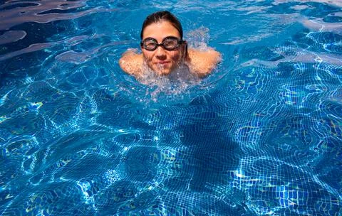 Boy in a swimming pool Stock Photos