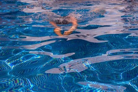 Boy in a swimming pool Stock Photos