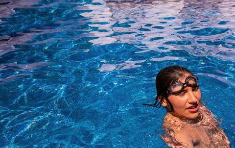 Boy in a swimming pool Stock Photos
