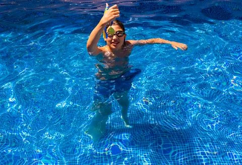 Boy in a swimming pool Stock Photos