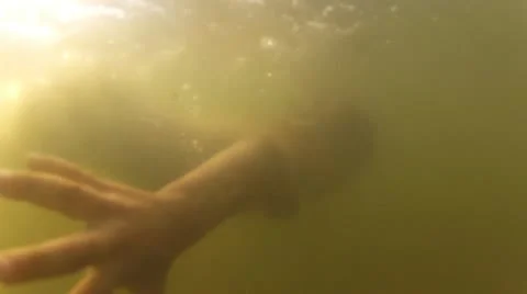 Boy swimming underwater Stock Footage 13572115