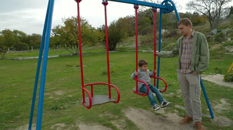 Boy on the Swing Stock-Footage 36563248