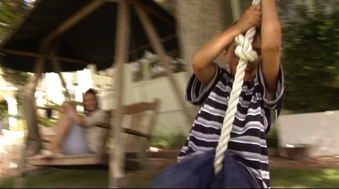 Boy on swing Stock Footage 43682931