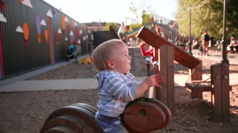 Boy on a swing Stock Footage 137635034