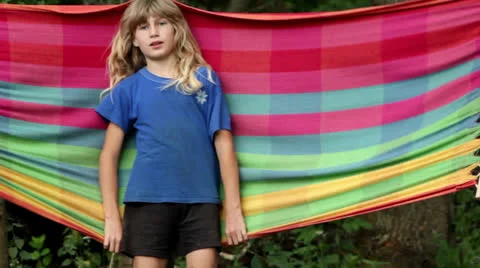 Boy swinging on a hammock Stock Footage 26303007