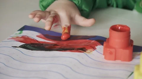 Boy at the table draws 動画素材 127379943