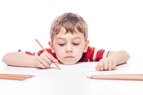 Boy at table Stock Photos