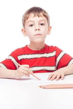 Boy at table Stock Photos