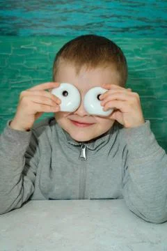 A boy at a table in a pizzeria Stock Photos