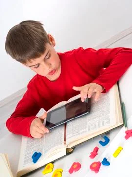 Boy with tablet computers Stock Photos