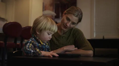 Boy Tablet Mom Five Pigs Video stock 47142174