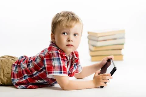 Boy with a Tablet PC. studio Stock Photos