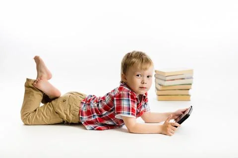 Boy with a Tablet PC. studio Stock Photos