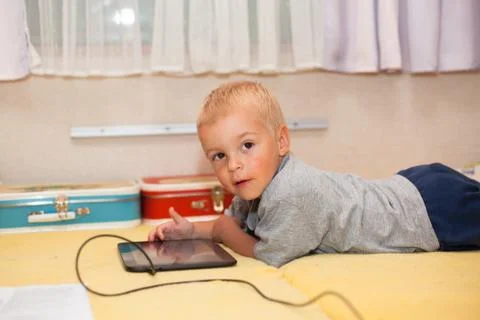 Boy with tablet Foto stock