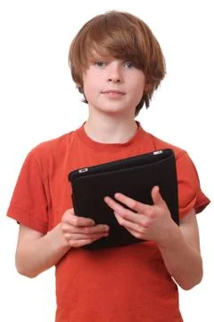 Boy with tablet Stock Photos
