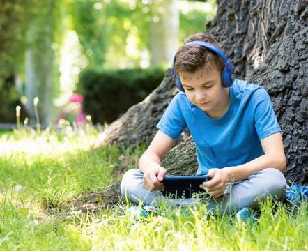 Boy with tablet Stock Photos
