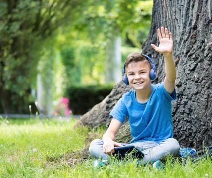 Boy with tablet Stock Photos