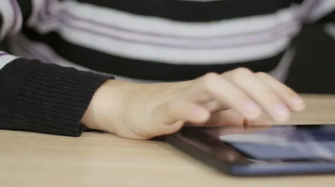 Boy with tablet at the table Stock Footage 68954128