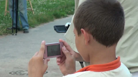 The boy takes on a mobile phone Stock Footage 25420526