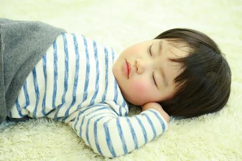Boy taking a nap Stock Photos
