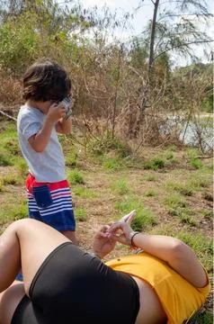 Boy taking photo session in the forest Stock Photos