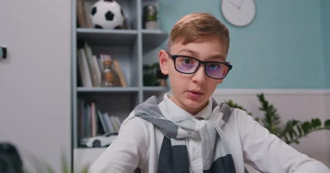 Boy talking to camera make conference at home. Happy kid doing work interview Stock Footage 232003807