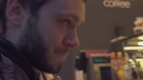Boy Talking with Friends Inside a Coffee Shop Stock Footage 69739440